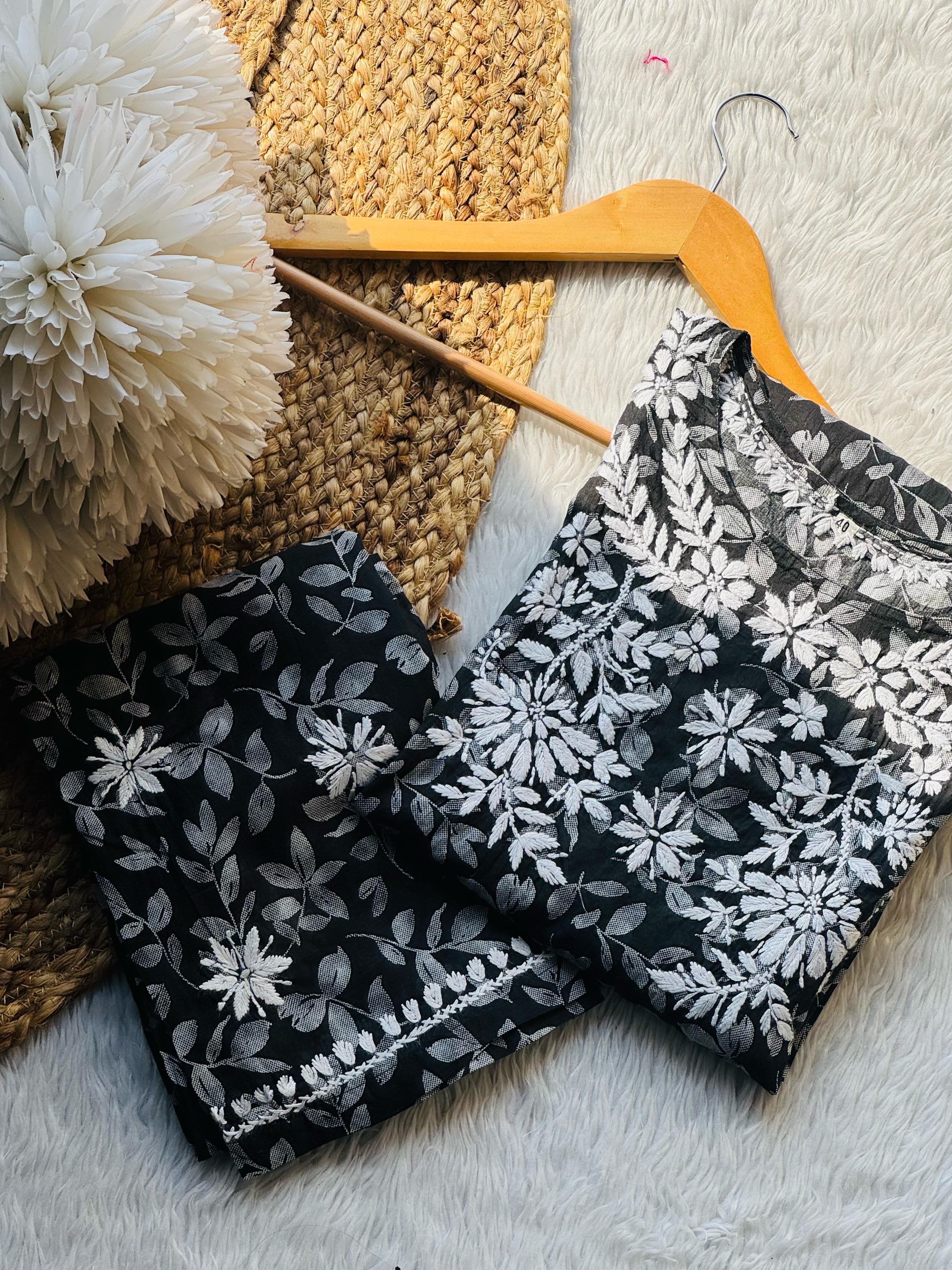 beatiful black printed mal boat neck set.