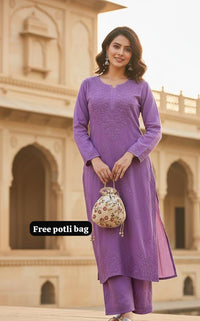 Modal lucknowi Daman rich work Kurta and plazzo with Potli Bag