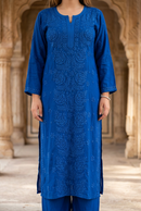 Blue rose-panel kurta in a heritage setting