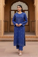 Royal blue Muqaish Chikankari kurti set with Mughal haveli background
