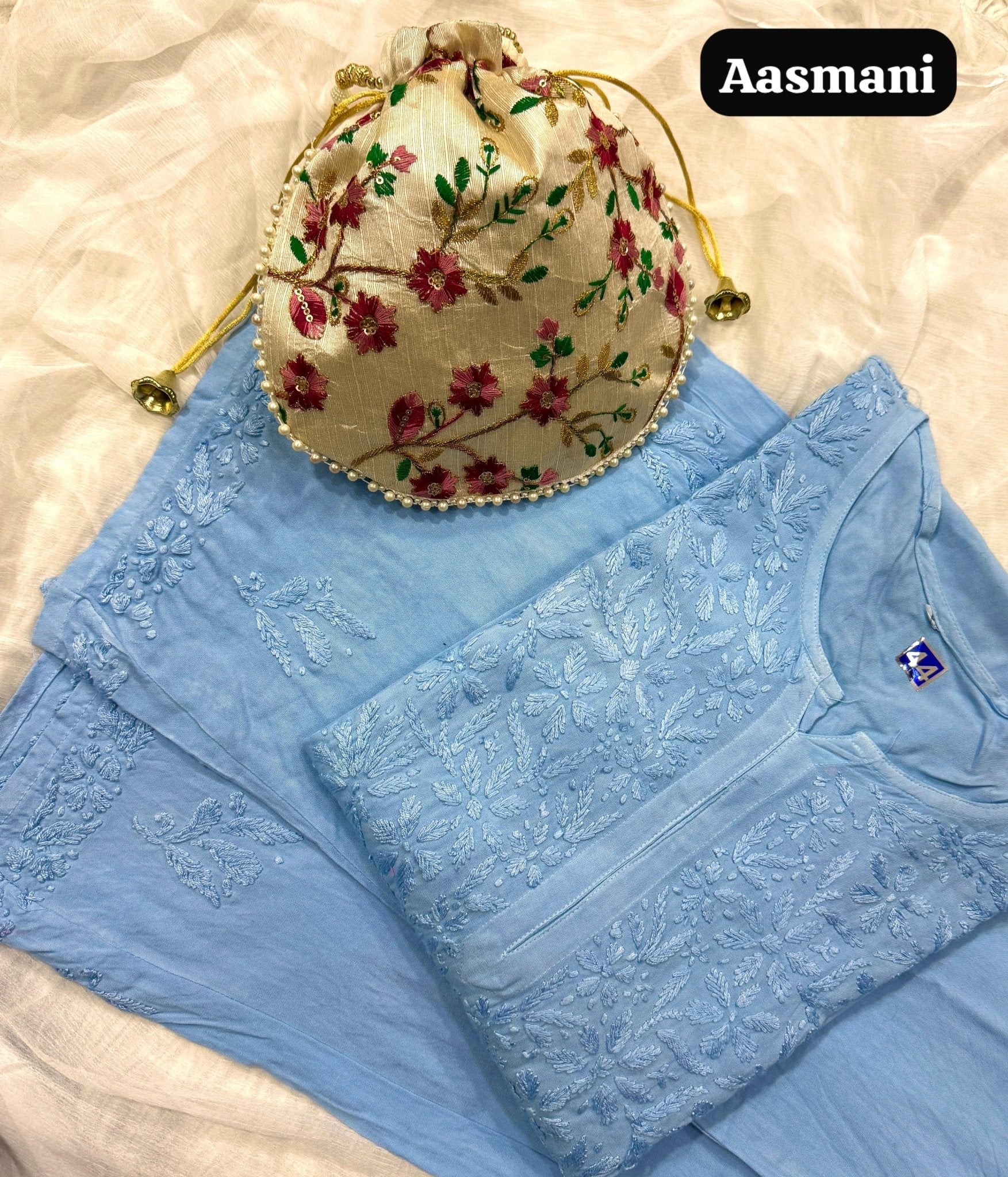 Modal lucknowi Daman rich work Kurta and plazzo with Potli Bag - Chikankari official